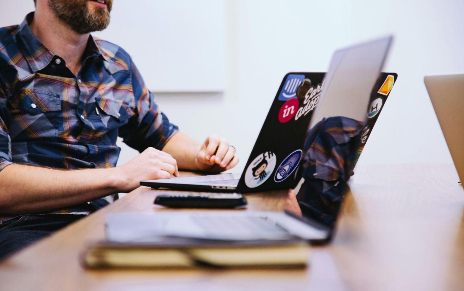 Professional consulting session reviewing franchise financial documents